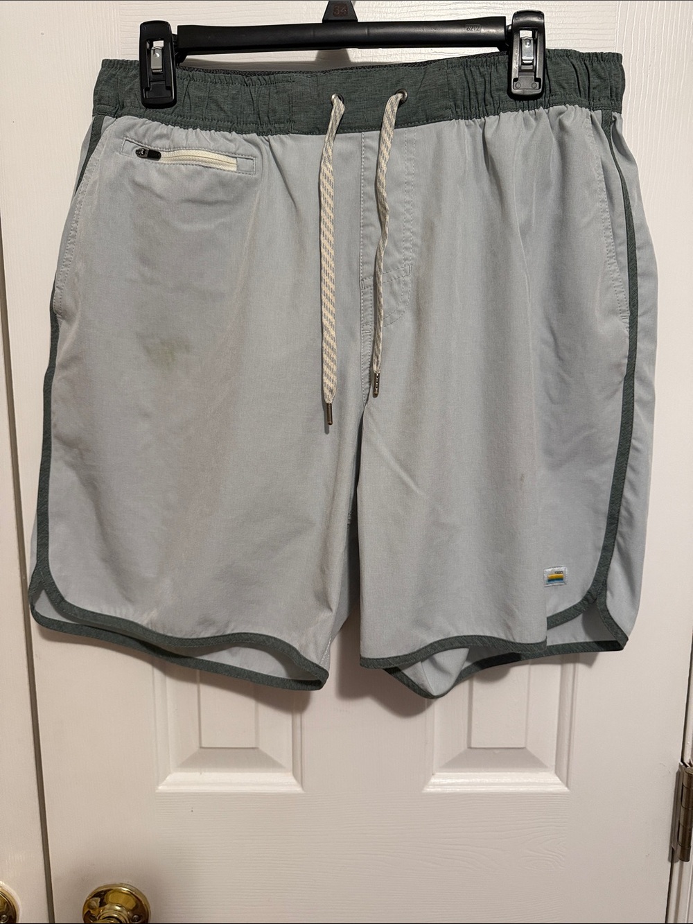 Vuori Light Gray Athletic Shorts with Dark Green Waistband and Trim